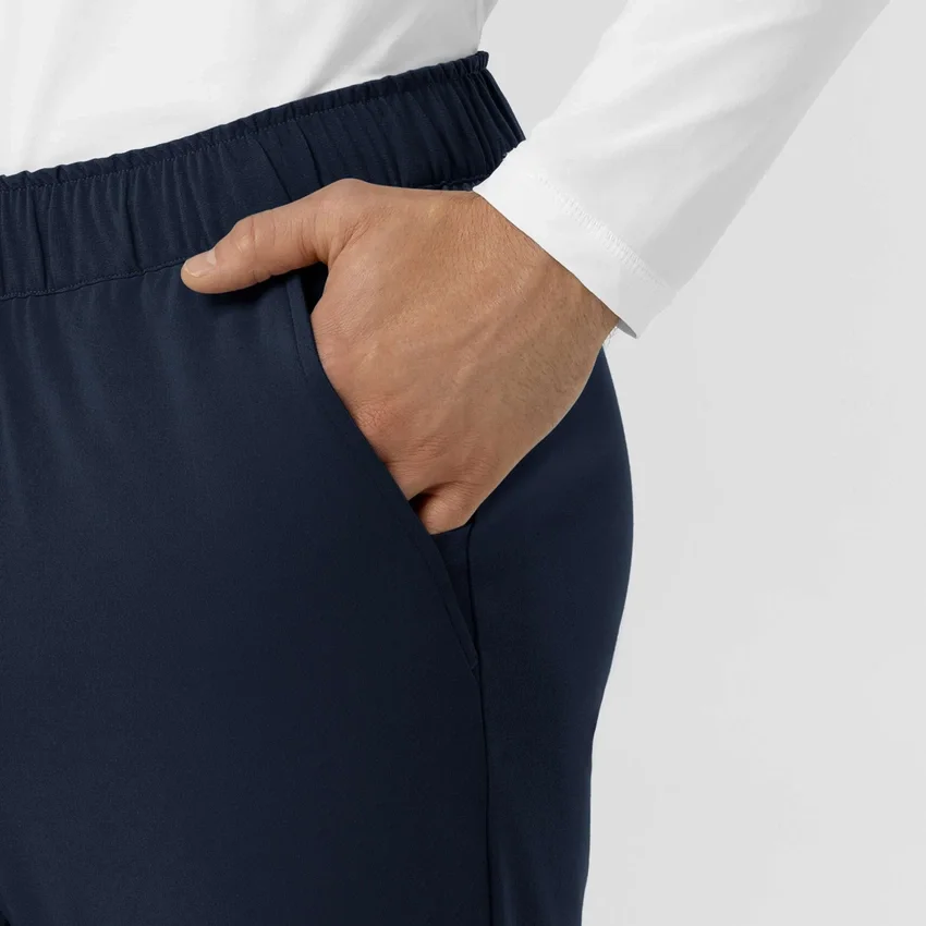 Force Cross-Flex gebreide scrubbroek met rechte pijpen en taps toelopende onderkant