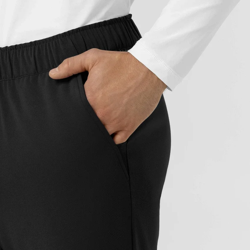 Force Cross-Flex gebreide scrubbroek met rechte pijpen en taps toelopende onderkant