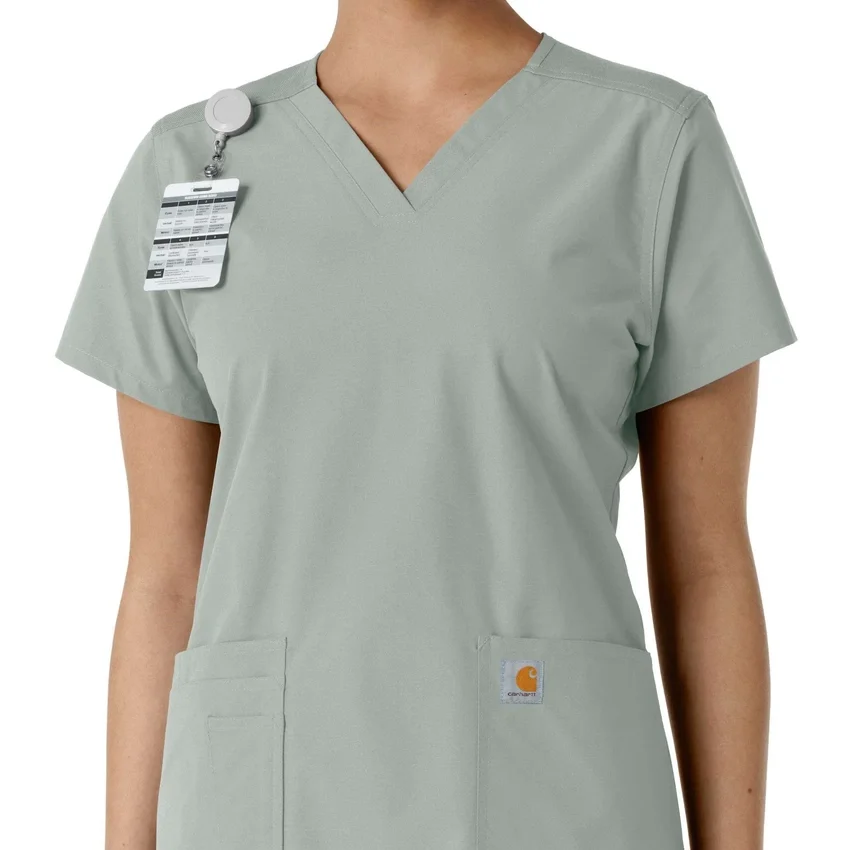 Force Essentials-scrubtop met V-hals en gebreide panelen voor dames