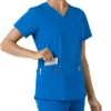 Force Essentials-scrubtop met V-hals en gebreide panelen voor dames